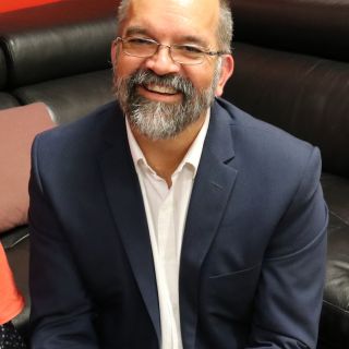 Professor Peter Radoll in his University of Canberra Office
