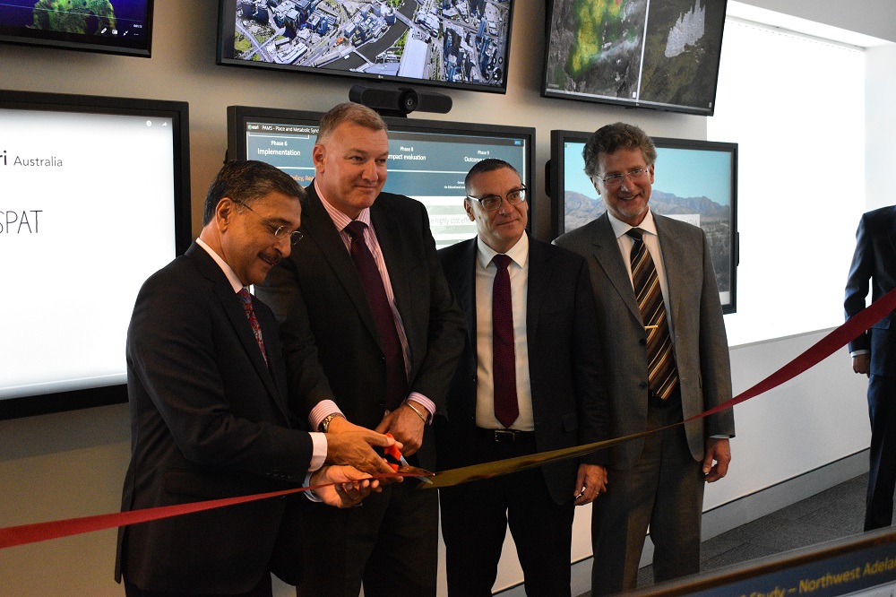 From left: University of Canberra Vice-Chancellor and President Professor Deep Saini, Michael De’Ath, Director-General of the ACT Health Directorate, Brett Bundock, Group Managing Director for Esri Australia and Esri South Asia, and Professor of Epidemiology Mark Daniel from the University of Canberra’s Health Research Institute, at the launch of the Australian Geospatial Health Lab.