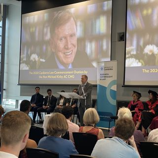 Michael Kirby delivering the commencement oration at UC