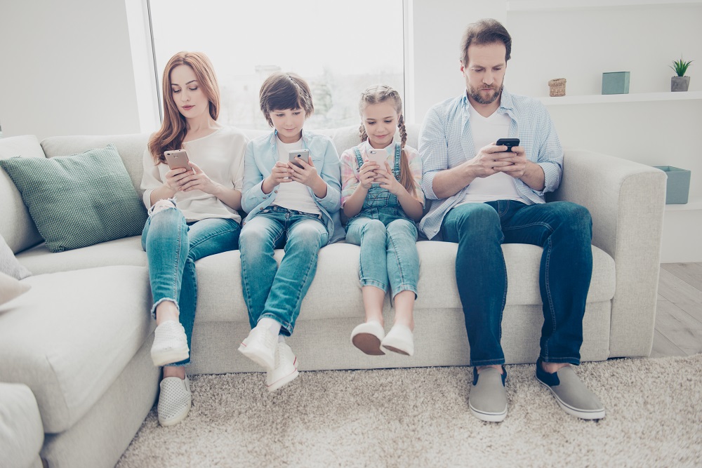 family on smart phones
