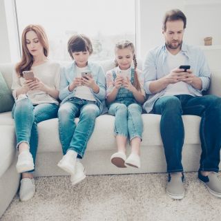 family on smart phones