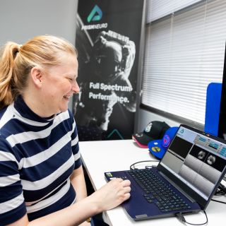 Woman using specialised software on a laptop