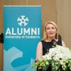 Inga speaking at an Alumni function