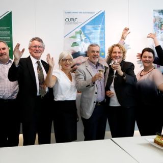 Members of the CURF team celebrate the recent birthday of their group