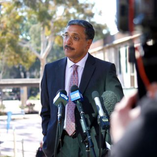 UC Vice-Chancellor Professor Deep Saini addresses journalists and cameras at the University of Canberra