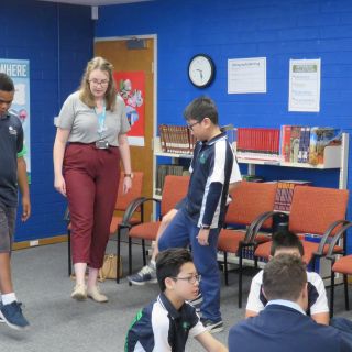 Preservice teachers exercising with Year 6 children at the launch of the Affiliated Schools Program
