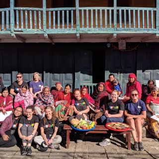 1.	The students with the women's community group from the Khora Ko Mukh Macchapucchare Rural Municipality, where they had a session on using the Poshan Nanglo concept for better nutrition. Photo: Lachhu Thapa/REACH For Nepal