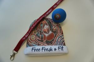 Lanyard, ball and beanie which say Free, fresh and fit