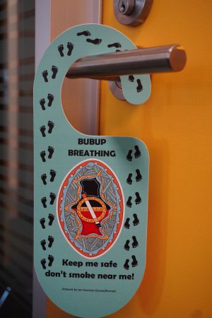 Door hanger front which says Bubup breathing, Keep me safe don't smoke near me