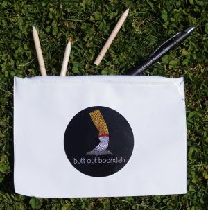Pencil case and coloured pencils which say Butt out boondah