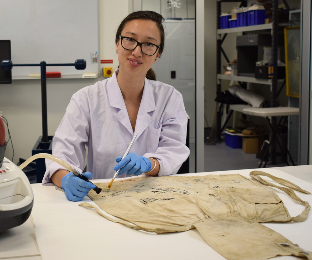 Image of Honours student Danica Auld working in UC's conservation lab