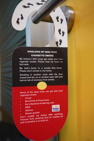 Door hanger back which has information about how smoke can affect babies