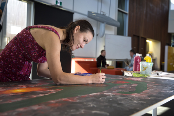 Australian Army soldier Lance Corporal Nixie Groth works on her visual arts project