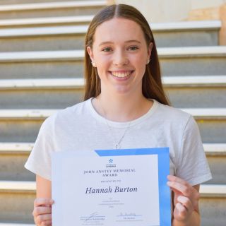Hannah with certificate