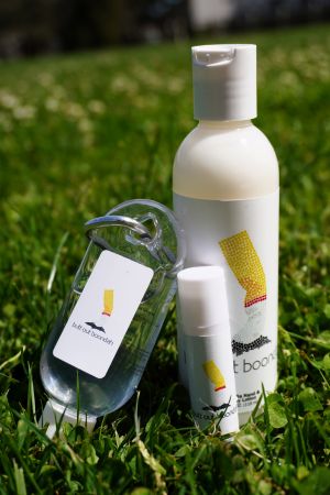 Lip balm, lotion and hand sanitiser which say Butt out boondah