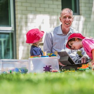 Tom Lowrie with early learning students