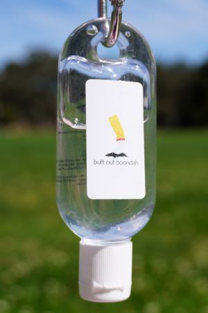 Hand sanitiser which says Butt out boondah
