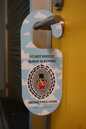 Door hanger which says Do not knock, Bubup sleeping, Smoke free home