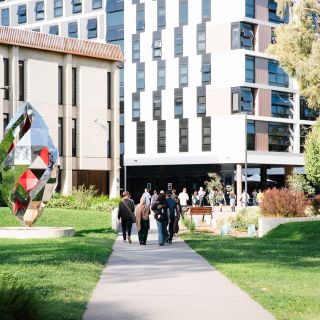 Photo of campus - students walking around campus