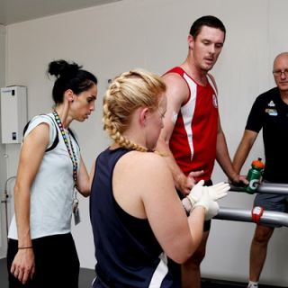 Dr Naroa Etxebarria, PhD candidate Rachel Gale, Ainslie Footballer Damian Bowles and Professor David Pyne in the Environmental Chamber