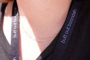 Lanyard which says Butt out boondah