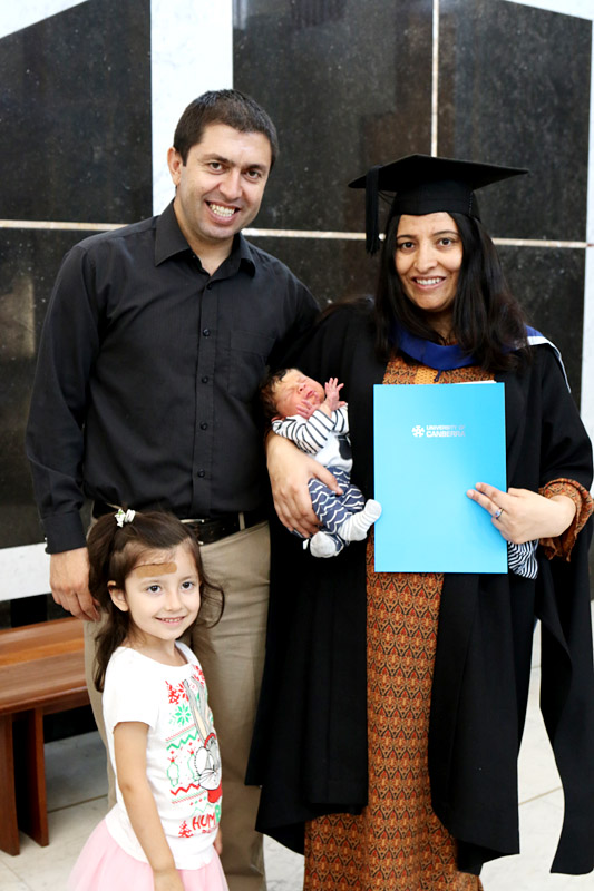 UC graduate Dilshad Pari with her family