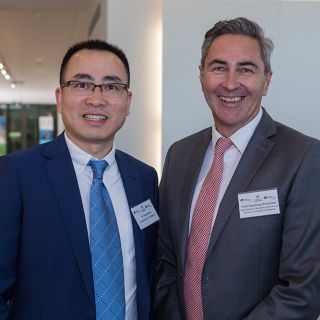 Researcher Dr Richard Hu and Dean of the Faculty of Business, Government and Law, Lawrence Pratchett
