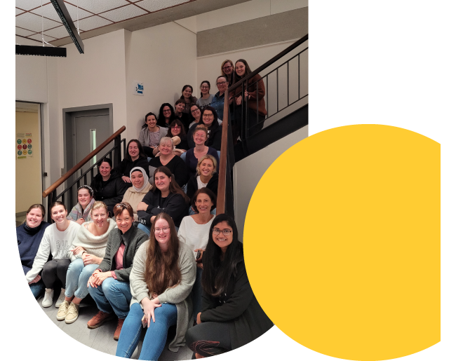 A banner image showing the 2022 group of midwifery students