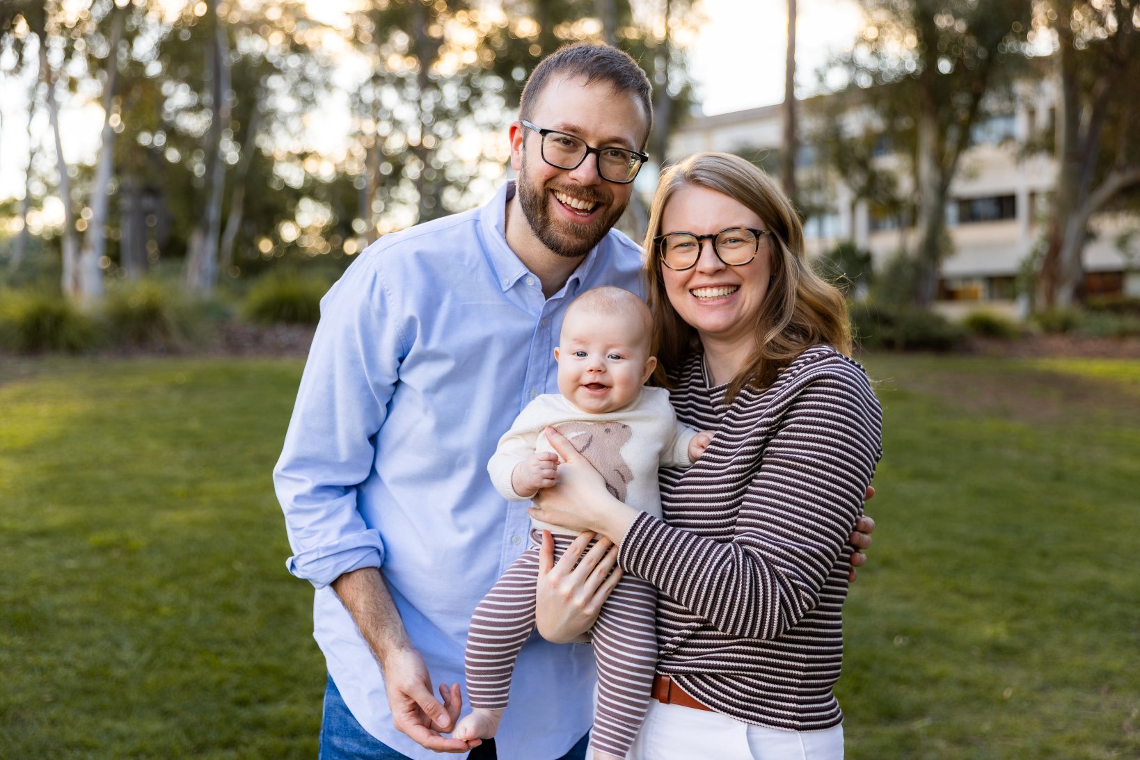 Megan Rueckwald with partner Chris and their baby