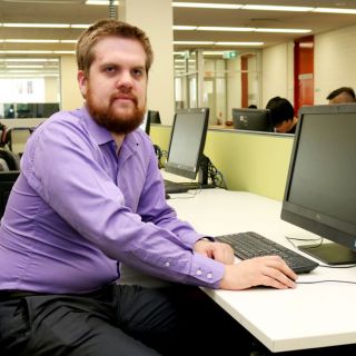 UC student Andrew Duck at the Library