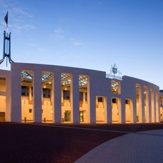 The entrance to Parliament House at night