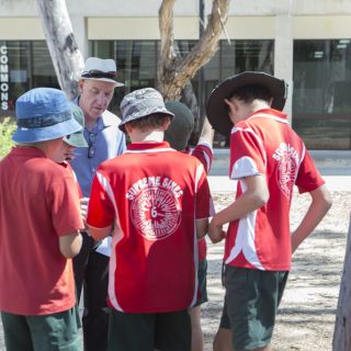 Professor Tom Lowrie with a group of year six students taking part in an orienteering exercise.
