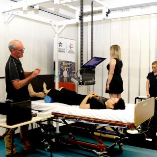 Professor Gordon Waddington and Honours student Ashleigh Marchant work with research volunteers on their proprioception study