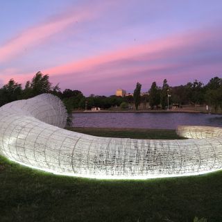 An ombre sunset serves as a dramatic backdrop to Namako, in its Aspen Island location