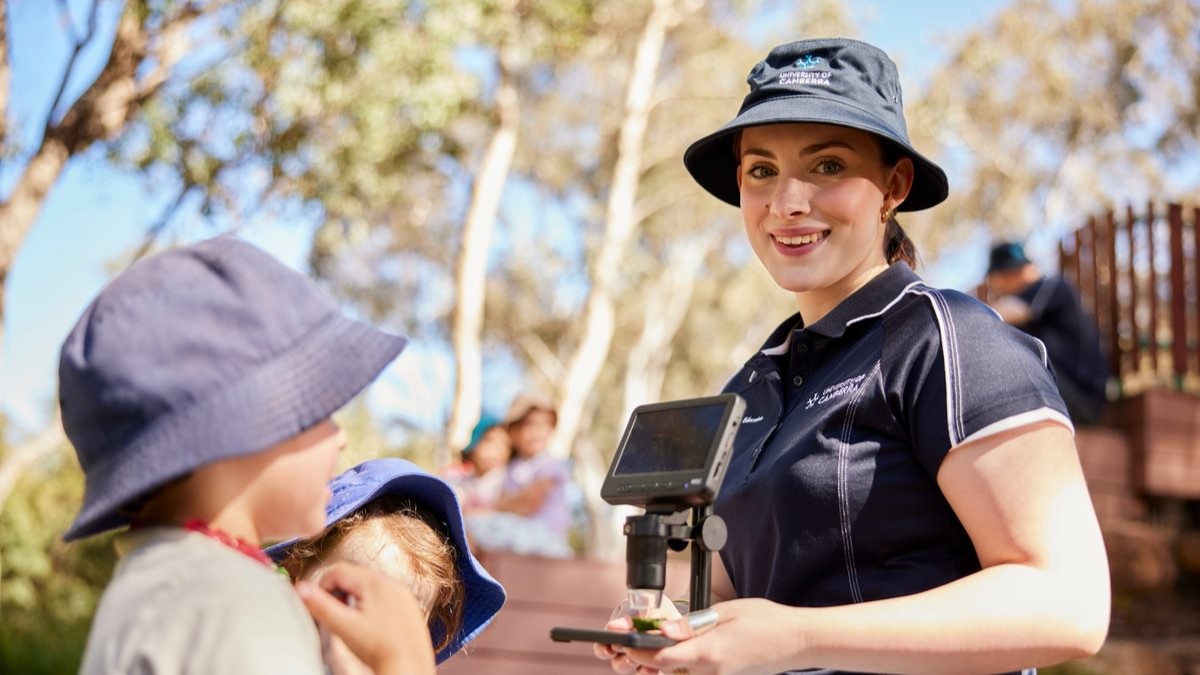 early childhood student working hands on