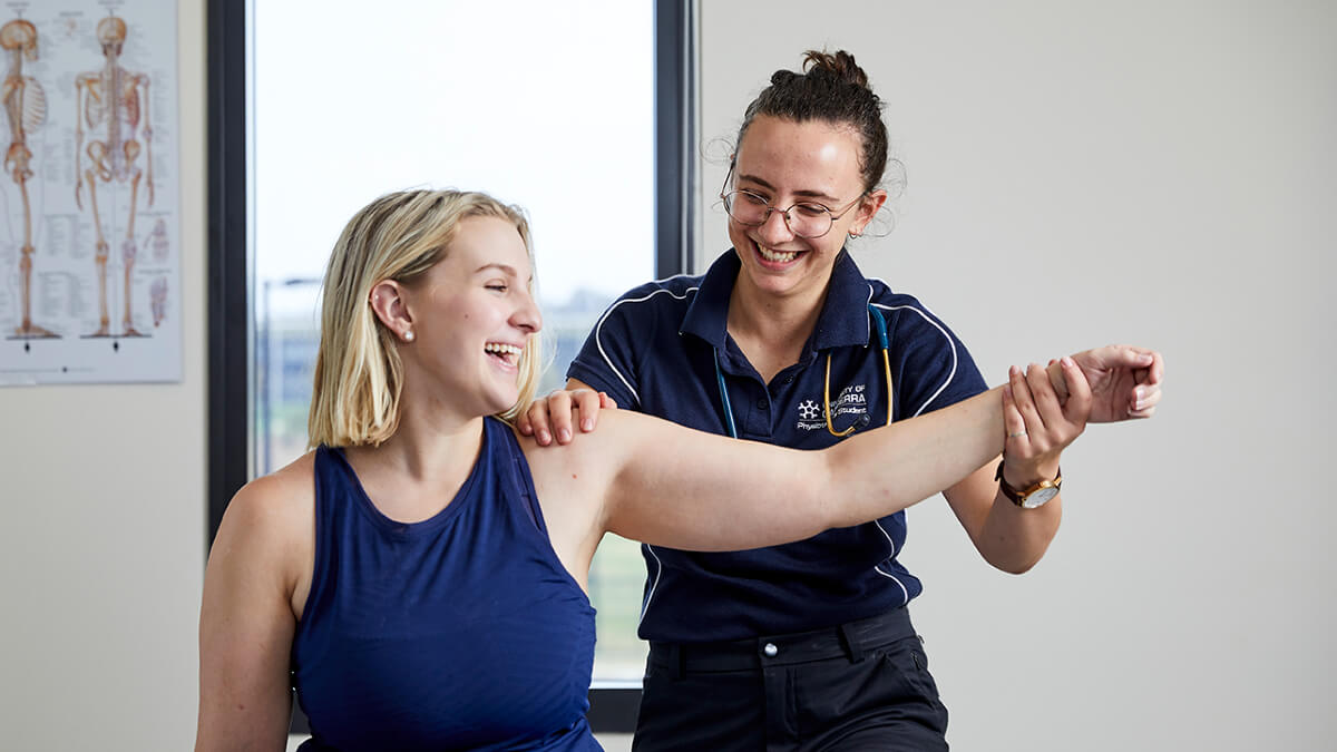 UC physiotherapy student treating female shoulder