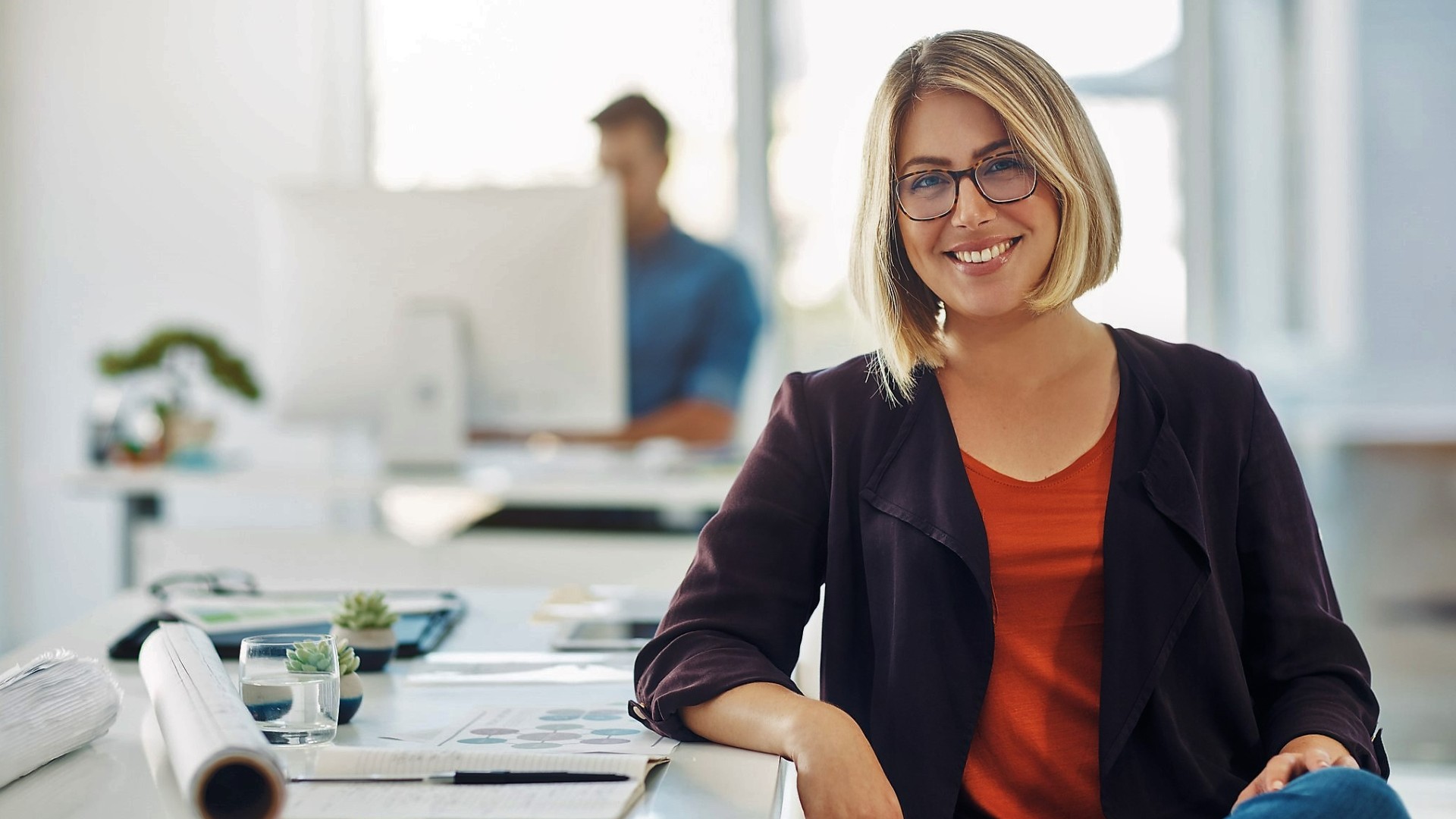 Smiling woman studying a Master of Creative Industries.