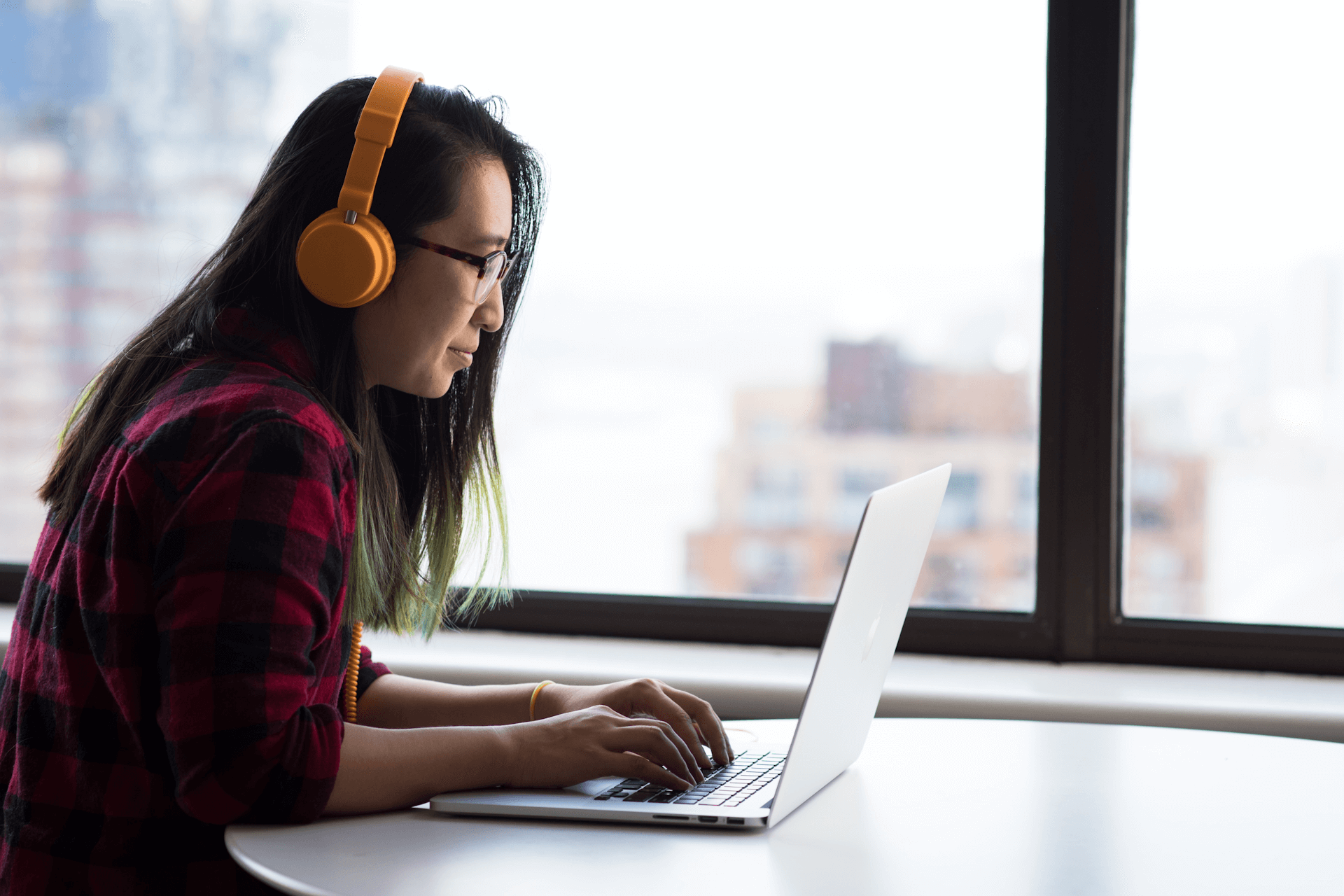 Student studying Grad Cert in Data Science online on her laptop